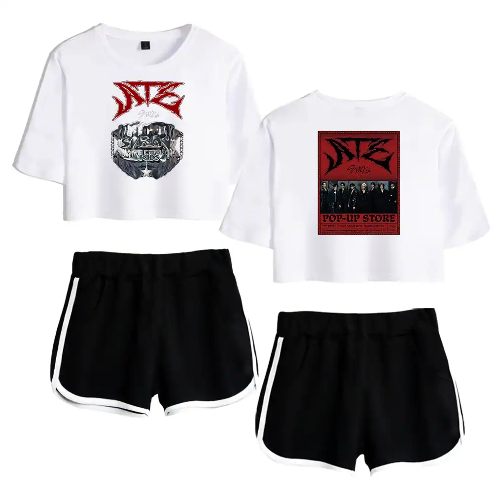 Kpop merch with graphic t-shirts and sporty shorts featuring band logos and images.