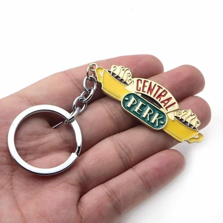 Colorful Central Perk coffee shop keychain with yellow banner and logo charm.