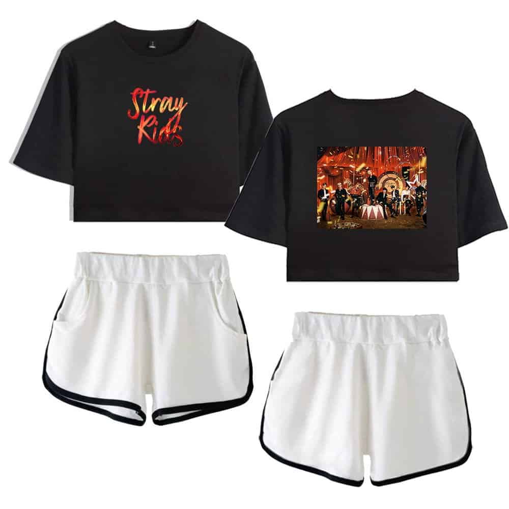 Black graphic crop top with band and white shorts, trendy Kpop merch outfit.