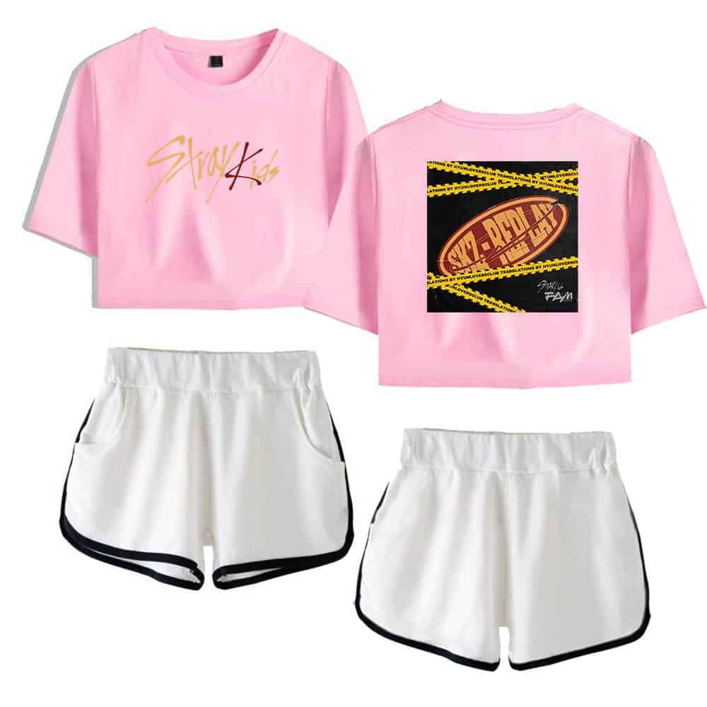 Kpop merch pink crop top and shorts set with bold graphic designs and signature accents.