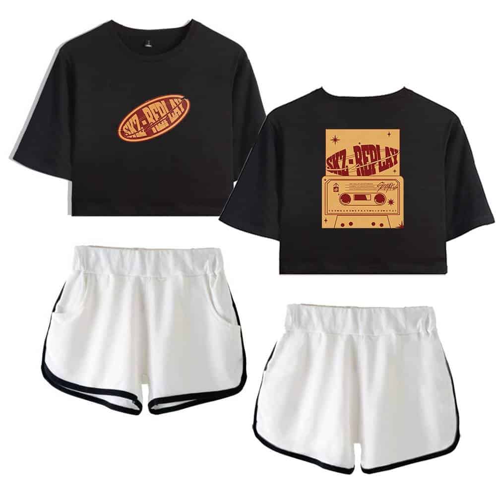 Graphic black crop top with retro cassette tape and SKZ-REPLAY logo, paired with white athletic shorts featuring black trim. Perfect K-pop merchandise for fans.