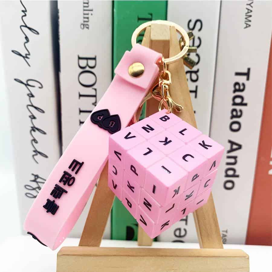 Filename: pink-kpop-merch-keychain-cube.jpg.