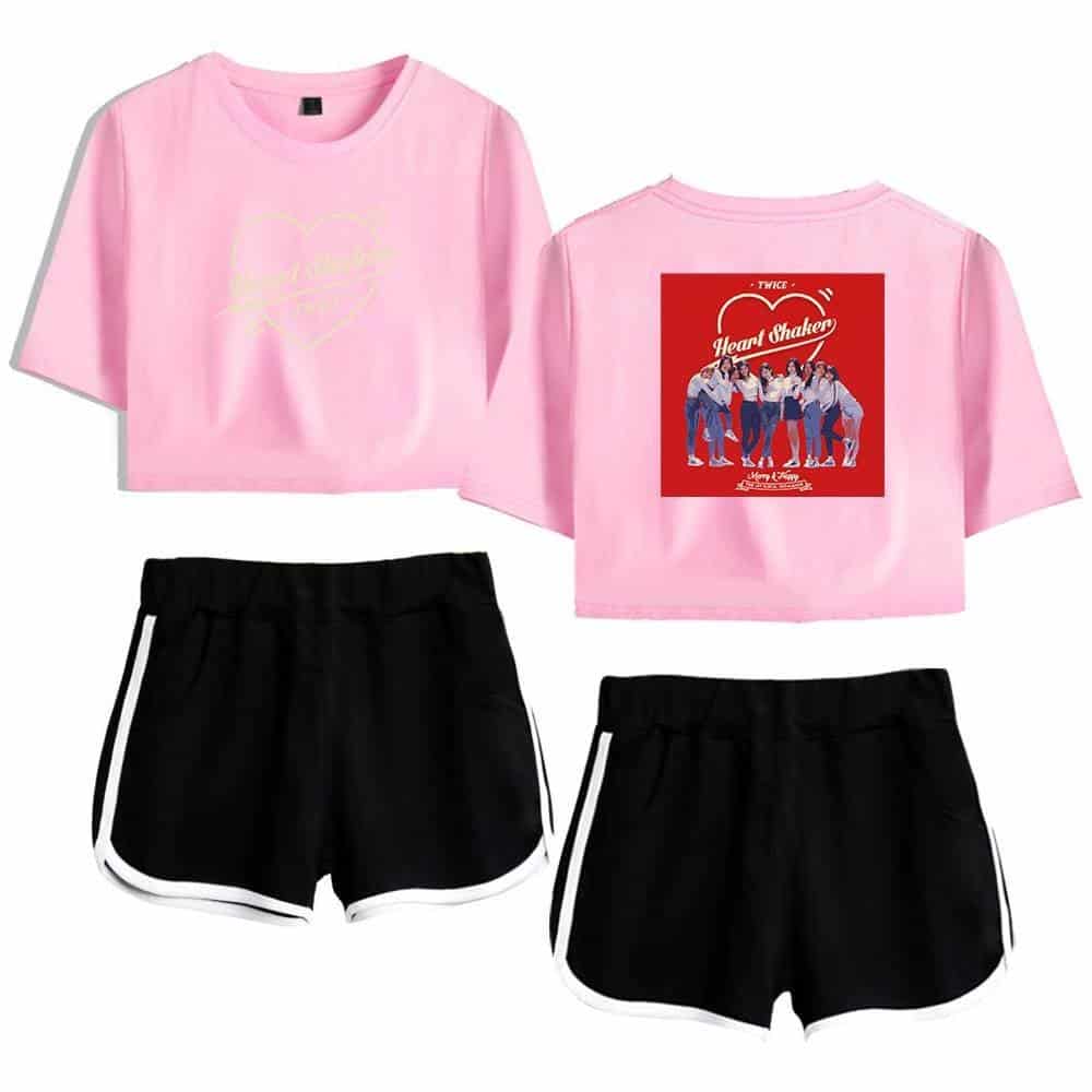 Bright pink K-pop merchandise crop top featuring a group image on the back and a subtle graphic on the front, perfect for fans and casual wear.