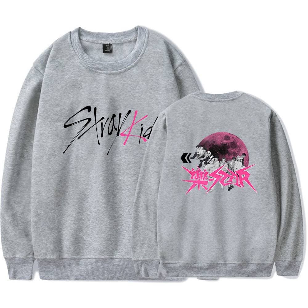 Show Kid sweatshirt with graphic design and pink moon illustration.