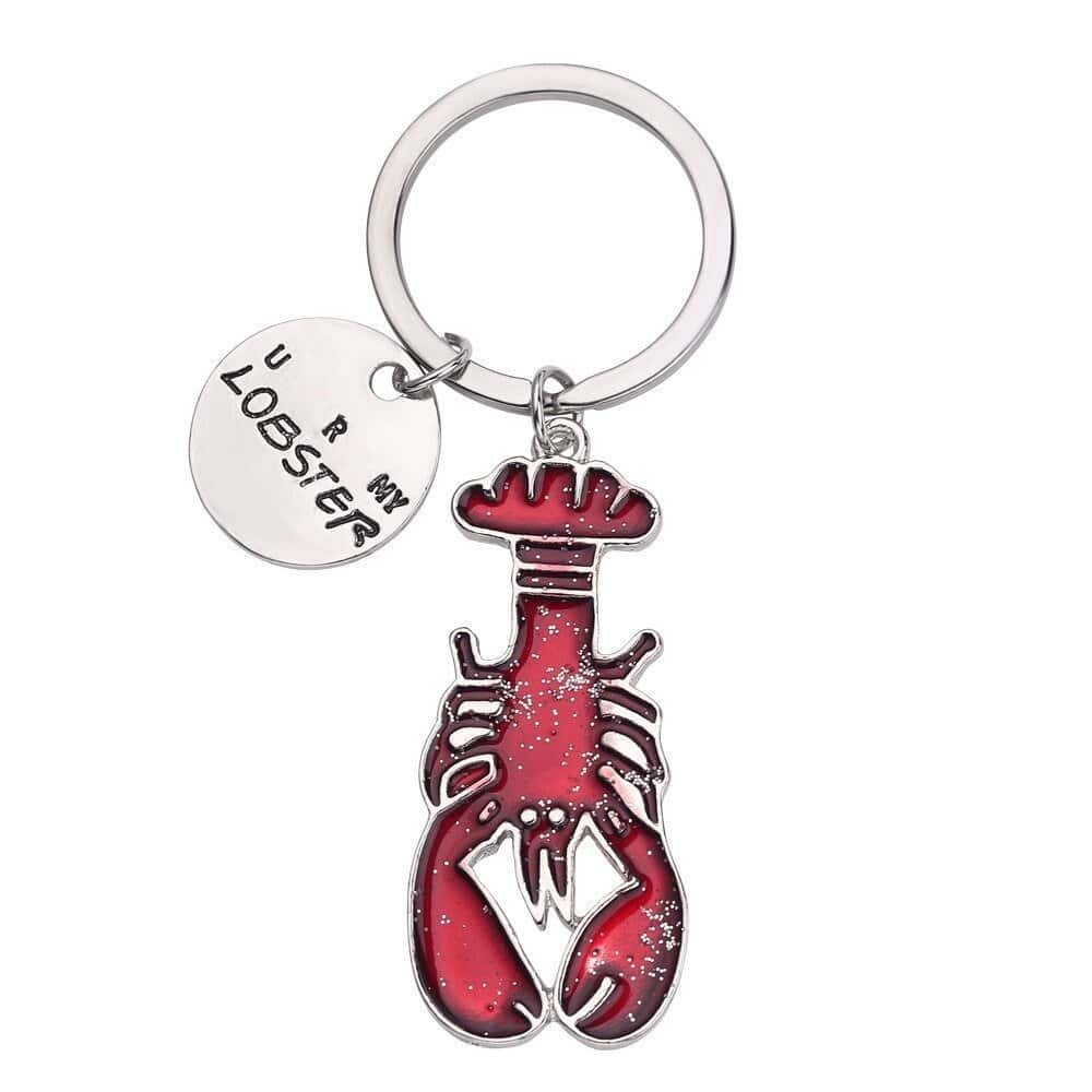 Kpop merch, Cute lobster-shaped keychain with red enamel finish and metallic accents, perfect for K-pop fans to decorate their bags or keys, stylish and trendy accessory.