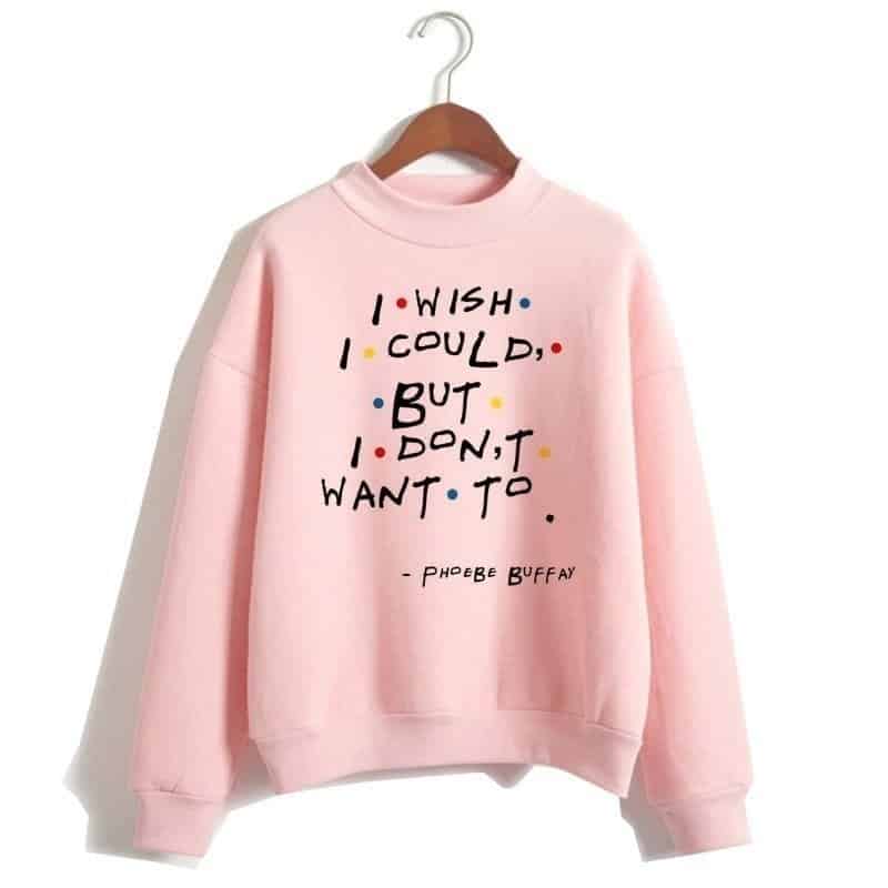 Pink sweatshirt with Phoebe Buffay quote about wish and want, casual style, graphic print, soft fabric, cozy everyday wear, cute and trendy clothing item.